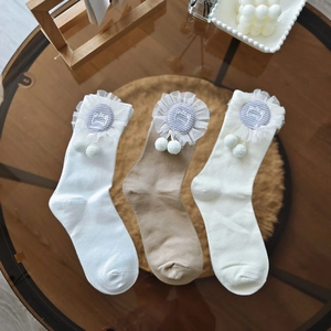 Detailed set of white and khaki Lolita socks with lace trim and cute cat patches
