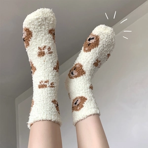 Thick coral fleece socks for women featuring cute brown bear patterns in cream white
