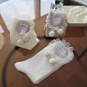 Baby cotton mid-calf socks with white lace trim, cat patches and soft fuzzy pom-poms