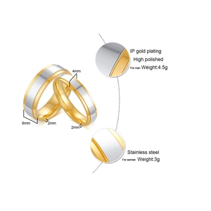 Detailed view of 4mm and 6mm gold-tone stainless steel couple rings with polished finish