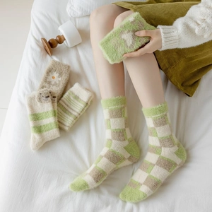 Thick fuzzy green mink velvet crew socks for women featuring cute bear and plaid patterns