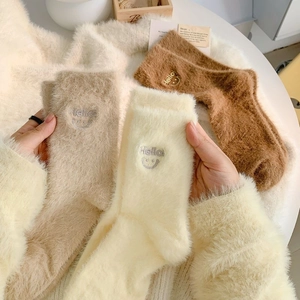 Tre paia di calze invernali in pile corallo spesse con simpatici ricami color terra