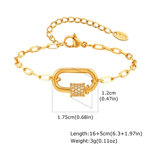Detailed macro view of an 18K gold-plated bracelet with a zircon-pave oval link and lobster clasp