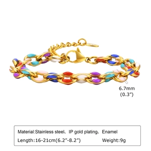 Detail view of gold stainless steel curb chain bracelet with colorful enamel links