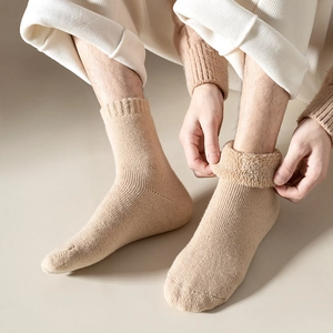 Warm thick wool blend socks in light brown with ribbed cuffs and cozy fleece lining