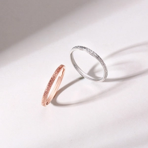 Minimalist matte stainless steel rings in rose gold and silver with frosted finish