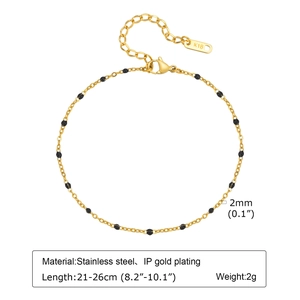 Detailed view of 18K gold plated stainless steel anklet with 2mm black beads and K18 tag