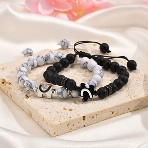 Adjustable stainless steel puzzle heart beaded bracelets for couples in black and white