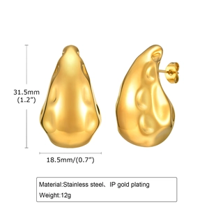 Detail view of large hammered gold teardrop earrings with dimensions and 18K plating info