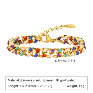 Macro detail of rainbow enamel Cuban chain link bracelet in 18K gold plated stainless steel