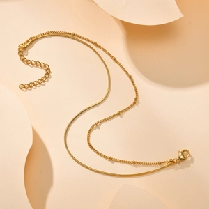 Double-layered 18K gold-plated stainless steel anklet with snake and bead chain