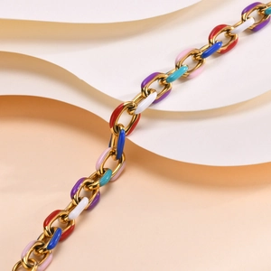 Macro view of colorful enamel link Cuban chain in 18K gold plated stainless steel