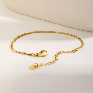 Bracelet élégant en maille épi plaqué or 18 carats avec fermoir mousqueton ajustable