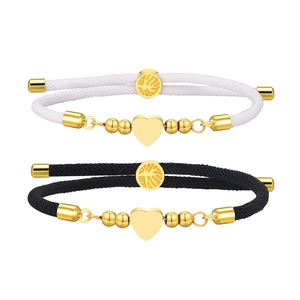 Adjustable black and white Milan rope bracelets with gold heart charms and tree of life sliders