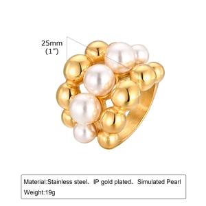 Detail of multi-layer cluster ring with gold spheres and simulated pearls 25mm diameter