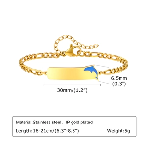 Detail of gold Figaro chain bracelet with blue enamel dolphin plate and measurements