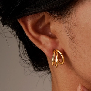 Modern triple band golden C-shaped hoop earrings for women with polished finish