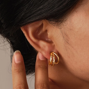 Golden stainless steel triple-layered C-shaped hoop earrings with a polished finish