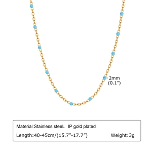 Detail of 2mm mint green beads on a gold-plated stainless steel chain necklace