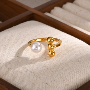 Adjustable gold stainless steel ring with white pearl and three vertical beads