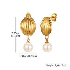 Macro view of gold shell earrings with pearl detail showing 2.95cm height measurements