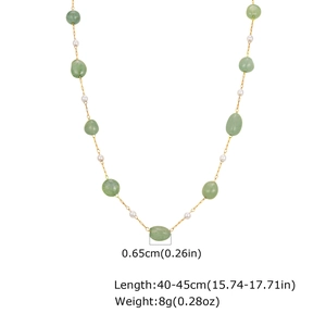 Detail of green faux jade and pearl gold chain necklace with 0.65cm bead size