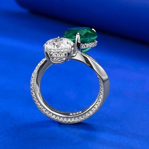 S925 sterling silver ring featuring a large 10mm emerald and round brilliant diamond