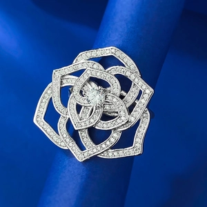 Elegant S925 silver camellia flower ring with multi-layered petals and sparkling zirconia