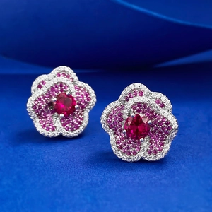 Elegant floral stud earrings with ruby red stone and pink cubic zirconia accents