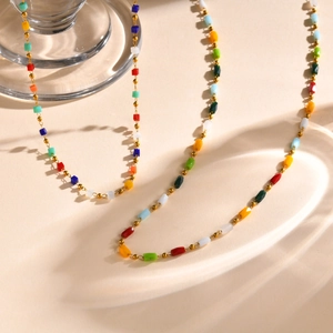 18K gold plated stainless steel necklace with colorful rectangular beads and soft shadows