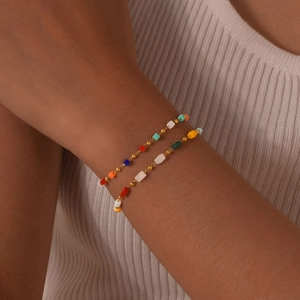 18K gold stainless steel chain bracelet set with colorful geometric beads on model wrist
