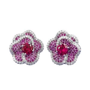 Classic floral stud earrings with ruby red stones and zircon pavé in elegant flower shape