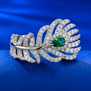 S925 silver feather ring with pavé stones and teardrop green gemstone centerpiece