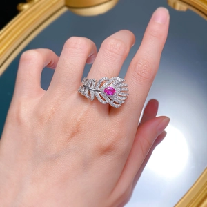 S925 silver feather ring with paved diamonds and oval pink gemstone on model hand