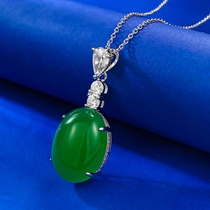 Elegant S925 silver necklace featuring an oval emerald green pendant with zircon accents
