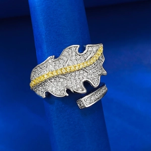Detailed macro view of 925 silver leaf open ring with micro-pave and yellow zircon stones