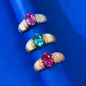 925 silver rings with oval gemstones and mother of pearl inlay in blue and pink colors