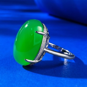 Silver 925 ring with large oval green chalcedony stone and sparkling zircon halo