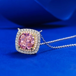 Luxurious cushion-cut pink gemstone pendant necklace with double halo setting and silver chain
