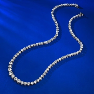Classic S925 silver tennis necklace with round-cut sparkling diamonds on blue background