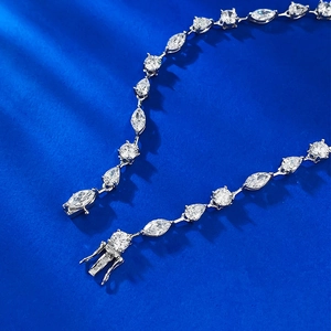 Macro shot of 925 silver bracelet featuring marquise and pear-cut cubic zirconia stones