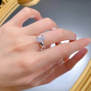 Close-up of S925 silver ring with oval ice-flower cut stone in a four-claw setting