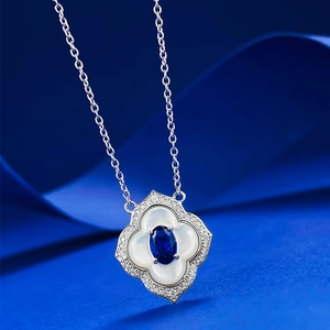 Elegant S925 silver flower necklace with blue sapphire and white mother-of-pearl