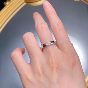 Close-up of S925 silver ring featuring a 5x5mm square pink diamond on a female hand