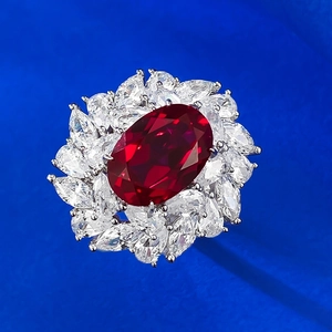 Luxurious S925 silver ring with 9x13mm oval pigeon blood red stone and zircon halo