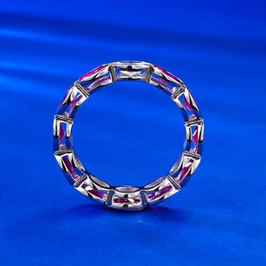 Detail view of S925 silver full eternity ring with oval pink crystals in geometric setting