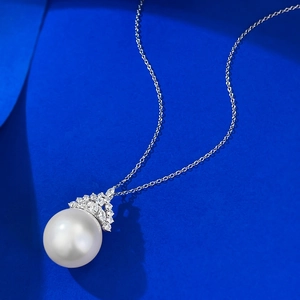Elegant S925 silver necklace with 16mm white pearl and crown diamond pendant on blue background