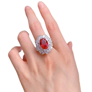 Luxurious S925 silver ring with oval pigeon blood red stone and marquise zircon halo