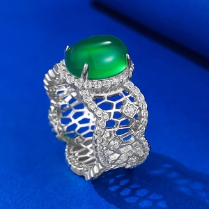 Luxurious 925 silver ring with oval green chalcedony and hollow honeycomb band
