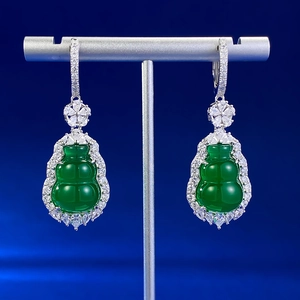 Macro detail of S925 silver gourd earrings with green chalcedony and pavé cubic zirconia